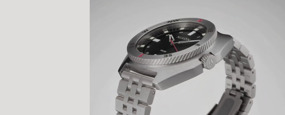 MP4 takedown of Nixon logo story showing different Nixon watches, pendulum, flames, on a gray background.